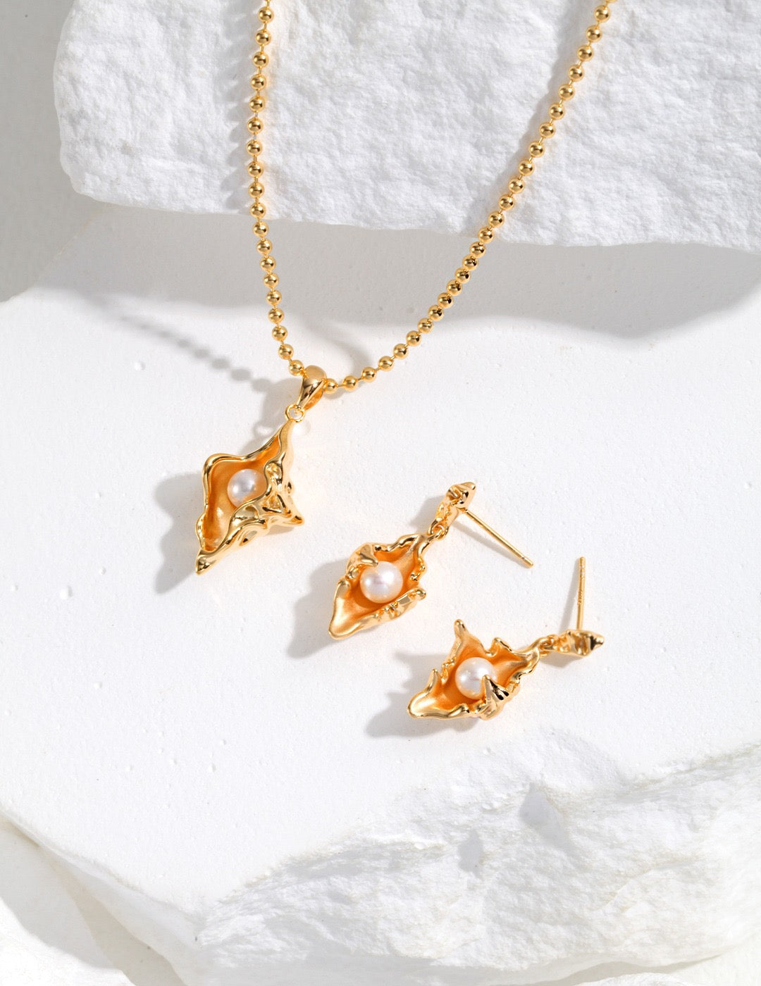 Molten Oyster Shell Pearl Drop Earrings
