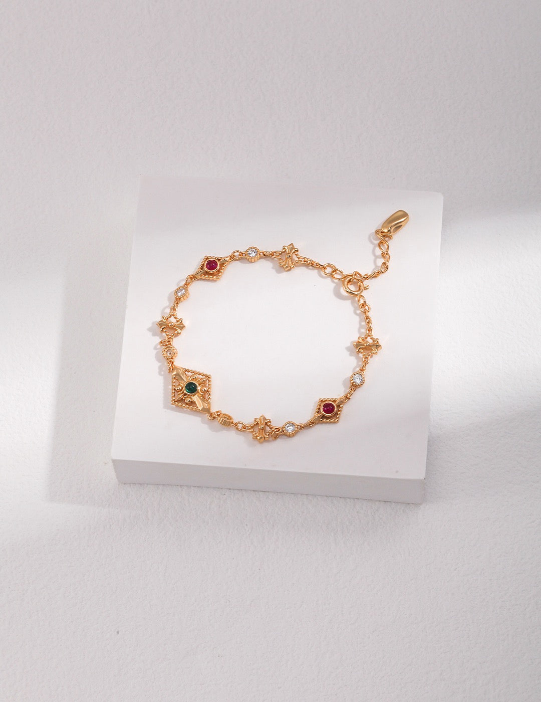 CZ Emerald & Ruby Fleur de Lys Station Bracelet