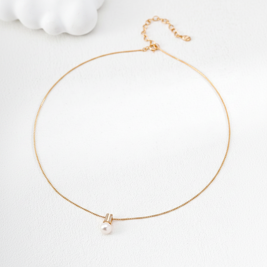 Lumière Pearl & Crystal Bar Necklace - 18K Gold on cream background