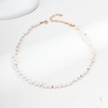 Keshi Pearl & Gold Rondelle Strand Necklace on cream white background – full circle view