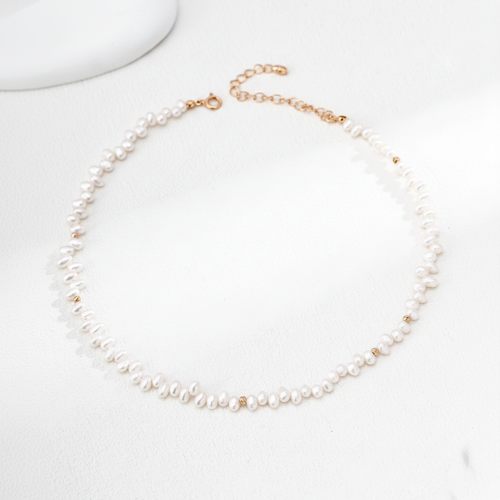 Keshi Pearl & Gold Rondelle Strand Necklace on cream white background – full circle view