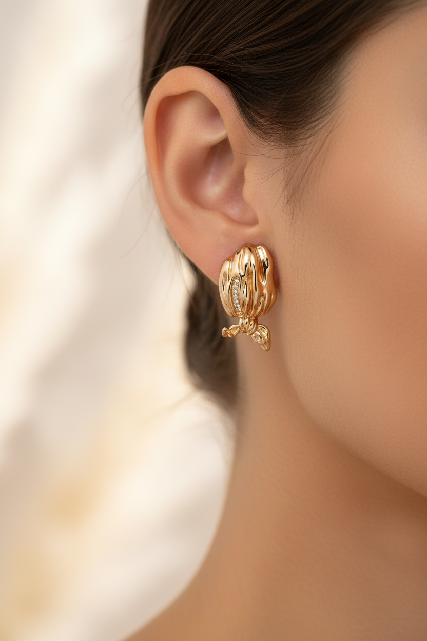 Model wearing Gold Vermeil Shell Earrings - close-up