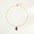 Lapis Lazuli Half-Moon Molten Frame Necklace on cream white background