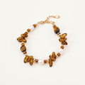 Tiger's Eye & Czech Glass Terre Fauve Bracelet - cream background flat lay