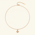 CZ Clover Snake Chain Pendant Necklace – 18K Gold on cream white background